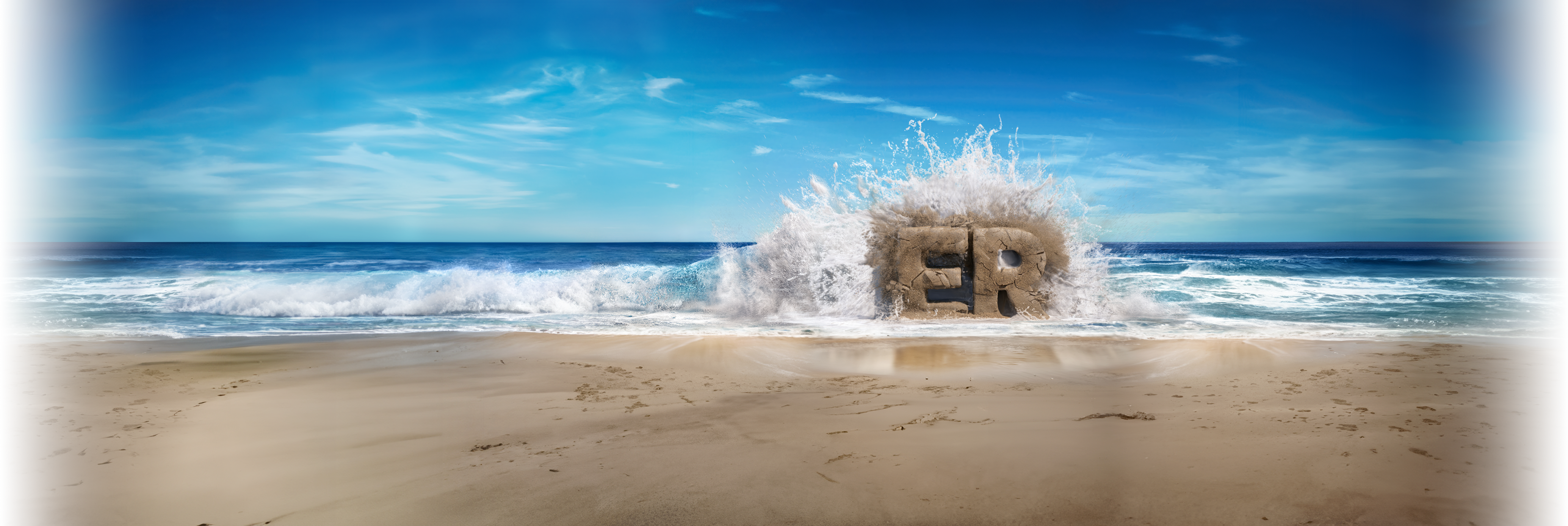 A sandcastle in the shape of the letters E and R is hit by a large wave on a beach